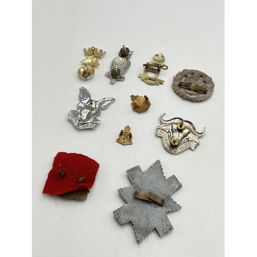 2370 - Ten military cap badges