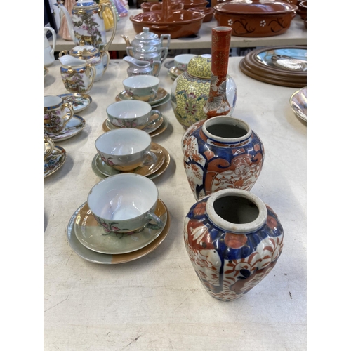 402 - Fifty six pieces of Oriental ceramics to include two 19th century Imari vases, Chinese hand painted ... 