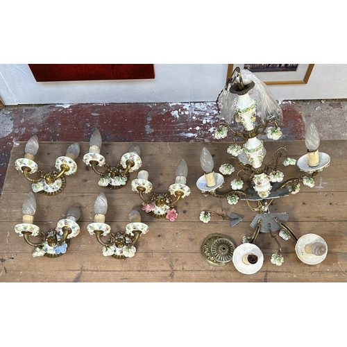 17 - Six pieces of 19th century style brass and floral decorated porcelain lighting, five wall sconces an... 