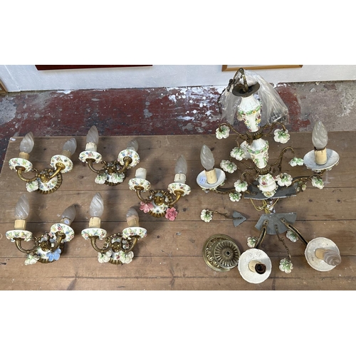 17 - Six pieces of 19th century style brass and floral decorated porcelain lighting, five wall sconces an... 