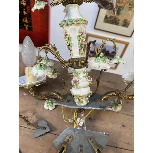 17 - Six pieces of 19th century style brass and floral decorated porcelain lighting, five wall sconces an... 