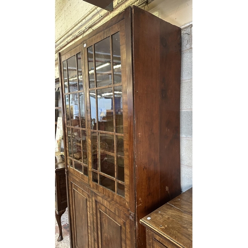 24 - A 19th century mahogany glazed bookcase - approx. 227cm high x 121cm wide x 50cm deep