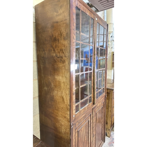 24 - A 19th century mahogany glazed bookcase - approx. 227cm high x 121cm wide x 50cm deep