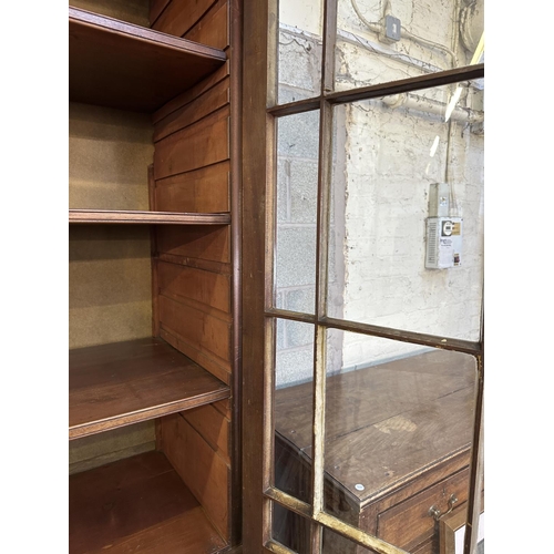 24 - A 19th century mahogany glazed bookcase - approx. 227cm high x 121cm wide x 50cm deep