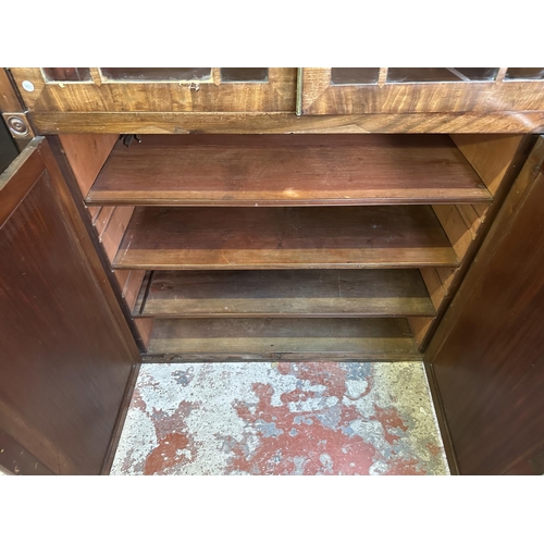 24 - A 19th century mahogany glazed bookcase - approx. 227cm high x 121cm wide x 50cm deep