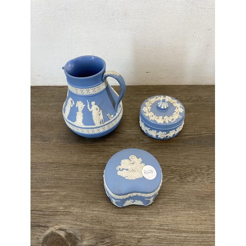 401 - Sixteen pieces of Wedgwood blue Jasperware to include 19th century silver plated three piece tea set... 