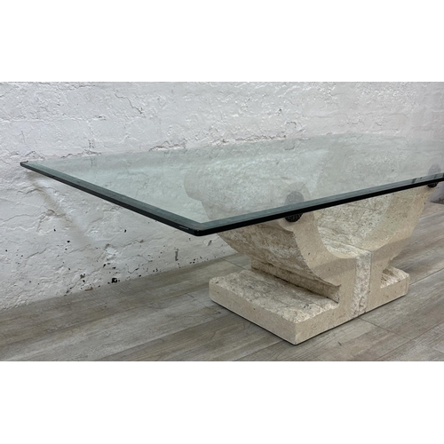 65 - A modern limestone effect fibreglass and bevelled glass top coffee table - approx. 43cm high x 76cm ... 