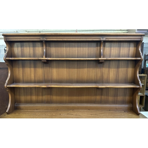 66 - An Ercol Golden Dawn elm and beech dresser - approx. 170cm high x 146cm wide x 50cm deep