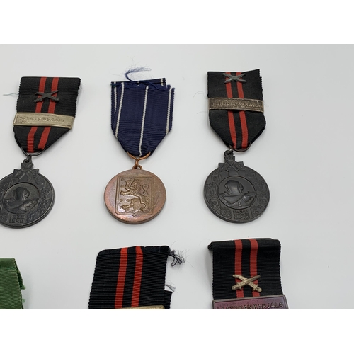 2371 - Eight Finnish military medals to include Liberty War, Continuation War, Winter War 1939-1940 etc.