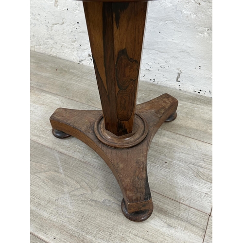 10 - A Victorian rosewood revolving piano stool with tan vinyl seat - approx. 56cm high