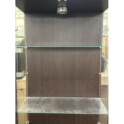 101 - A modern walnut effect and glass display cabinet with three glass shelves - approx. 172cm high x 58c... 