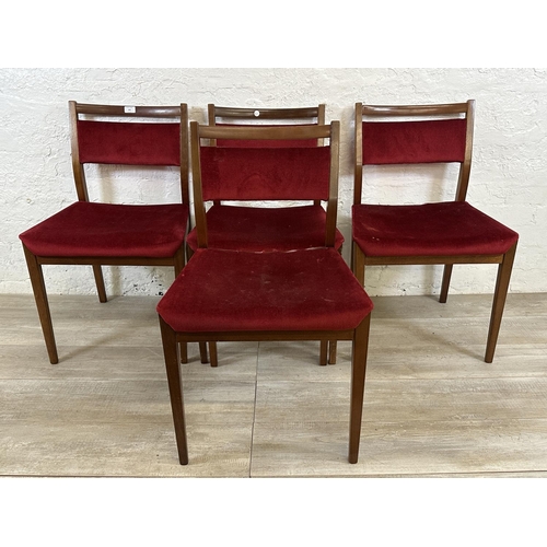 105 - Four mid 20th century G Plan teak and red fabric upholstered dining chairs