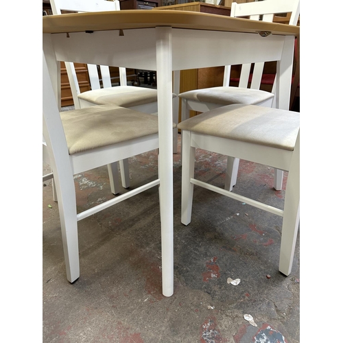 107 - A modern oak effect and white painted extending dining table and four chairs - approx. 74cm high x 8... 