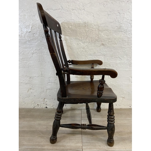 108 - A Victorian elm and beech farmhouse armchair - approx. 104cm high x 55cm wide x 48cm deep