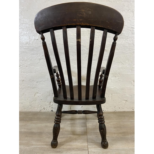 108 - A Victorian elm and beech farmhouse armchair - approx. 104cm high x 55cm wide x 48cm deep