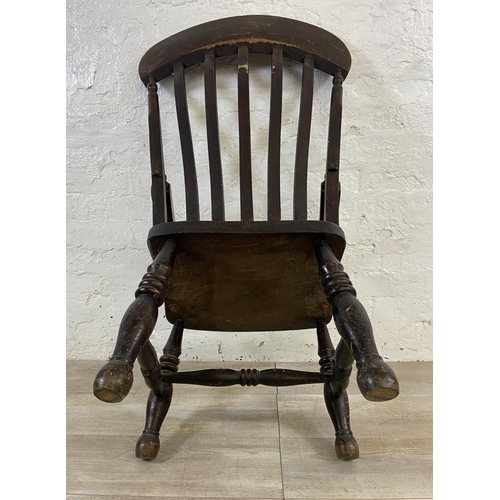 108 - A Victorian elm and beech farmhouse armchair - approx. 104cm high x 55cm wide x 48cm deep