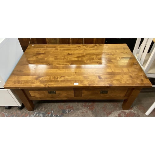 110 - An Arighi Bianchi hardwood two drawer coffee table - approx. 49cm high x 75cm wide x 130cm long