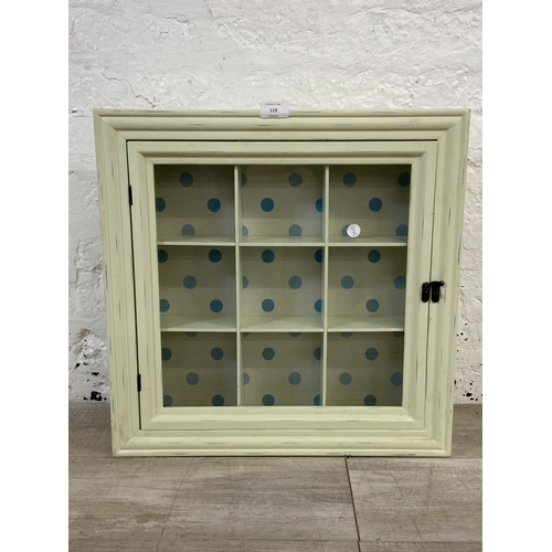 119 - A modern green painted wall hanging display cabinet - approx. 50cm high x 50cm wide x 10cm deep