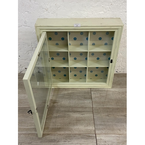 119 - A modern green painted wall hanging display cabinet - approx. 50cm high x 50cm wide x 10cm deep