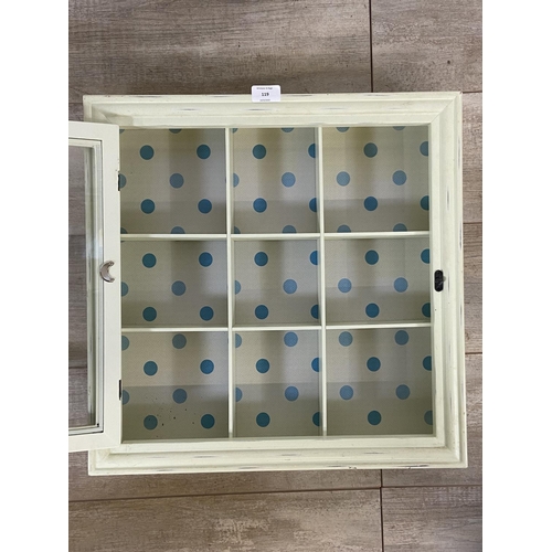 119 - A modern green painted wall hanging display cabinet - approx. 50cm high x 50cm wide x 10cm deep