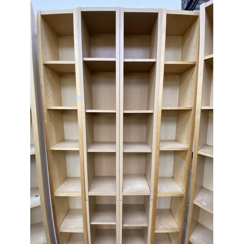 121 - Eight IKEA beech effect CD racks - approx. 202cm high x 20cm wide x 17cm deep