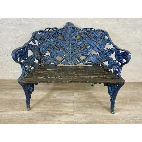 A Victorian Coalbrookdale style blue painted cast iron fern pattern and wooden slatted garden bench - approx. 88cm high x 114cm wide x 55cm deep