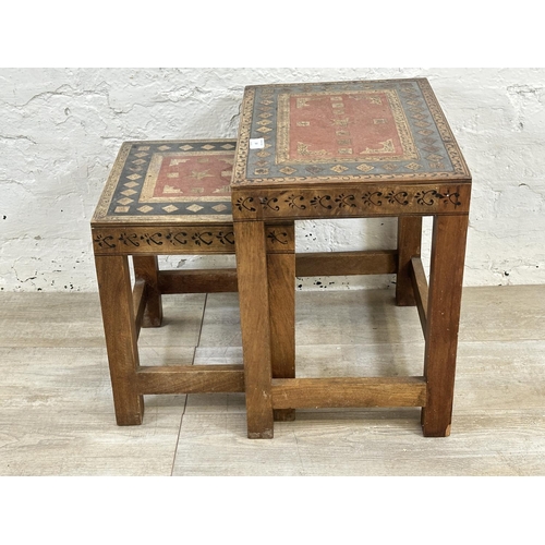 14 - A Middle Eastern hand painted and inlaid hardwood nest of two tables - approx. 44cm high x 43cm wide... 