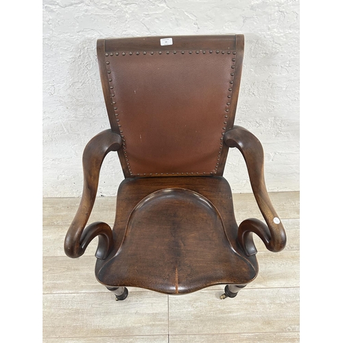 15 - A 19th century Holland & Sons mahogany and brown leather library chair - approx. 103cm high x 67cm w... 