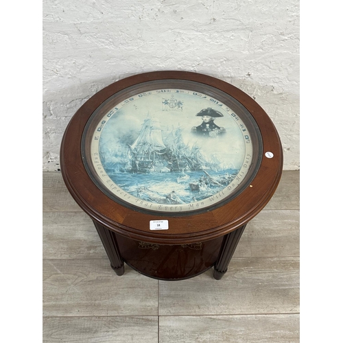 18 - A Danbury Mint The Trafalgar mahogany and glass circular side table - approx. 56cm high x 56cm diame... 