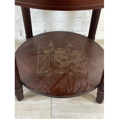 18 - A Danbury Mint The Trafalgar mahogany and glass circular side table - approx. 56cm high x 56cm diame... 