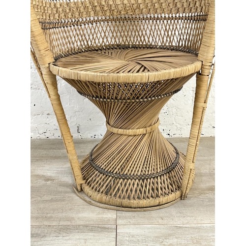 19 - A mid 20th century wicker peacock chair - approx. 113cm high x 69cm wide x 49cm deep