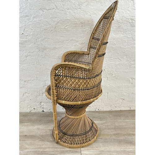 19 - A mid 20th century wicker peacock chair - approx. 113cm high x 69cm wide x 49cm deep