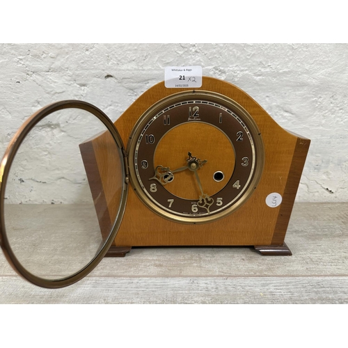 21 - Two clocks, one Bentima walnut cased eight day battery powered mantel clock - approx. 21cm high and ... 