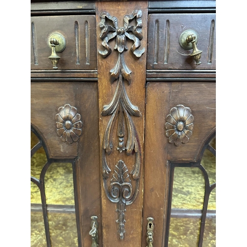 25 - A Victorian carved mahogany display cabinet - approx. 114cm high x 135cm wide x 42cm deep