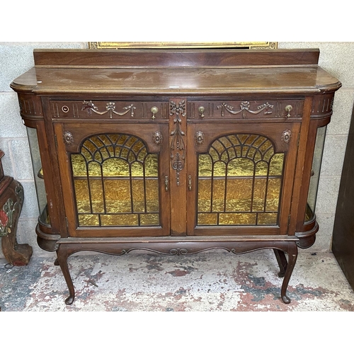 25 - A Victorian carved mahogany display cabinet - approx. 114cm high x 135cm wide x 42cm deep