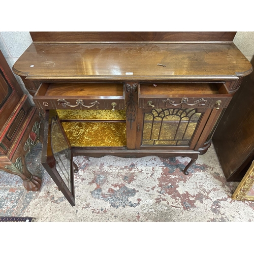 25 - A Victorian carved mahogany display cabinet - approx. 114cm high x 135cm wide x 42cm deep