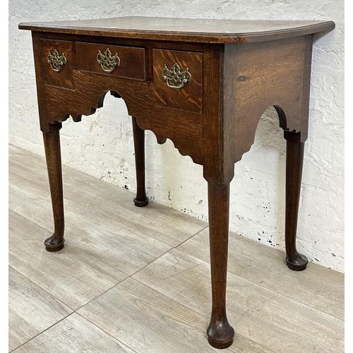 31 - A George III oak lowboy - approx. 71cm high x 76cm wide x 47cm deep