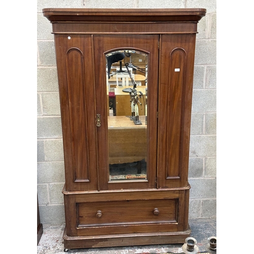 32 - A Victorian mahogany mirror door wardrobe - approx. 208cm high x 121cm wide x 50cm deep