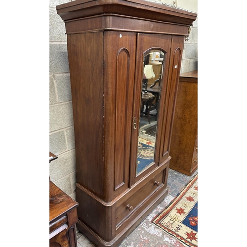 32 - A Victorian mahogany mirror door wardrobe - approx. 208cm high x 121cm wide x 50cm deep