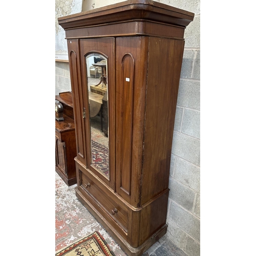 32 - A Victorian mahogany mirror door wardrobe - approx. 208cm high x 121cm wide x 50cm deep