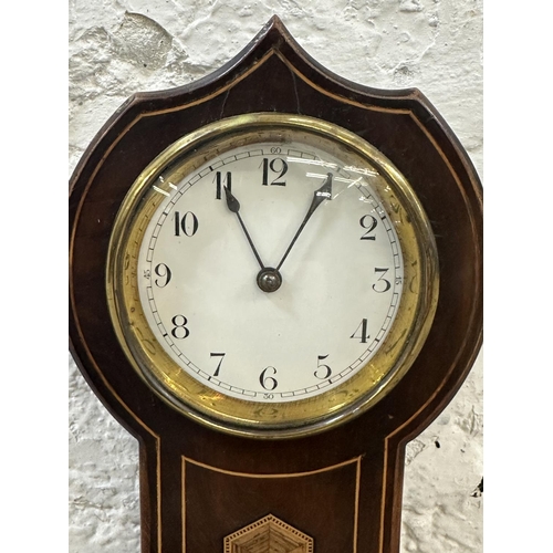 35 - An early 20th century French inlaid mahogany cased mantel clock - approx. 24cm high x 13cm wide x 9c... 