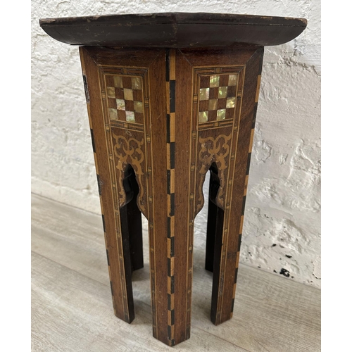 40 - A late 19th/early 20th century Moorish inlaid hardwood hexagonal side table - approx. 47cm high x 33... 