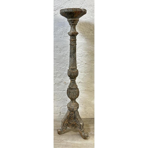 41 - A pair of 19th century style aged terracotta tripod pedestal torchères - approx. 98cm high