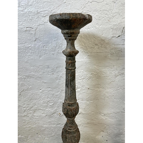 41 - A pair of 19th century style aged terracotta tripod pedestal torchères - approx. 98cm high