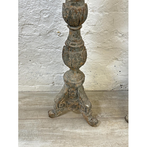 41 - A pair of 19th century style aged terracotta tripod pedestal torchères - approx. 98cm high