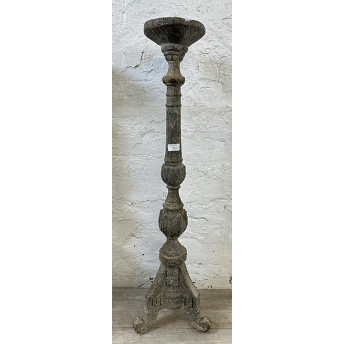 41 - A pair of 19th century style aged terracotta tripod pedestal torchères - approx. 98cm high