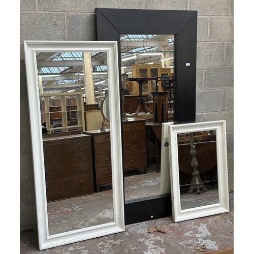 44 - Three IKEA framed wall mirrors - largest approx. 190cm x 94cm