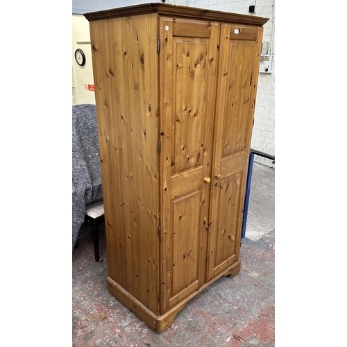 46 - A pine double wardrobe - approx. 192cm high x 98cm wide x 60cm deep