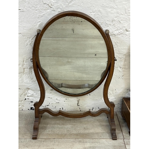 49 - Two 19th century mahogany framed swing dressing table mirrors - largest approx. 54cm high