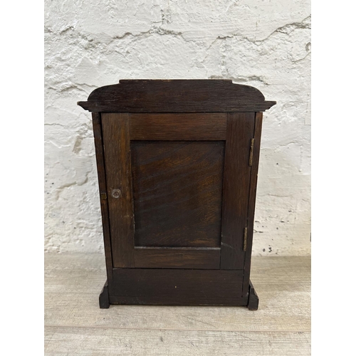 53 - An early 20th century British New Haven oak cased chiming mantel clock with key and pendulum - appro... 